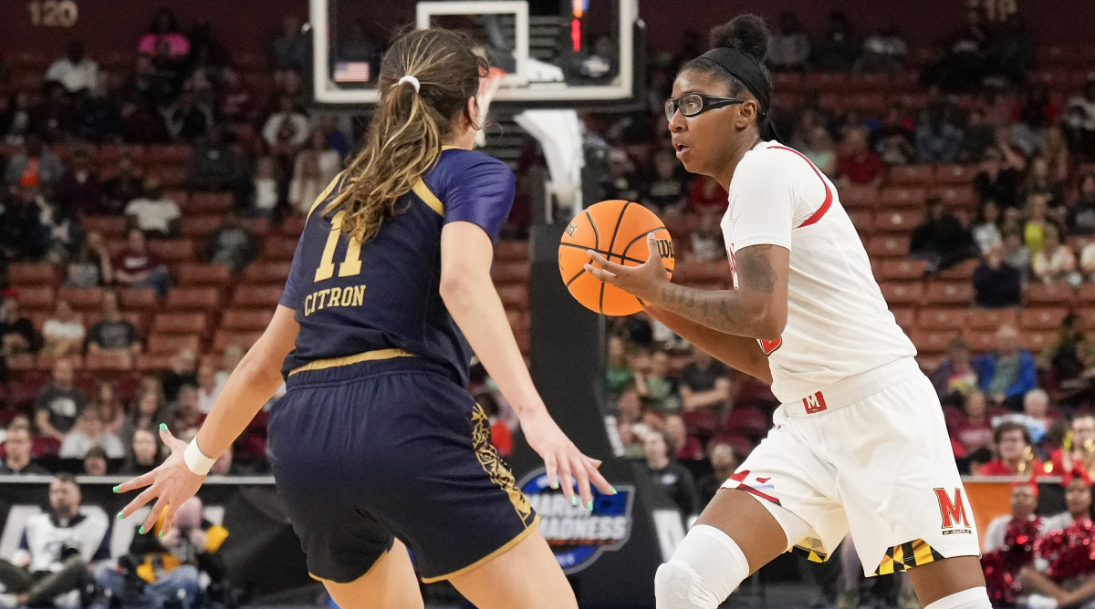 Maryland Terrapins guard Shyanne Sellers passes the ball while defended by Notre Dame Fighting Irish guard Sonia Citron during the Sweet 16 of the NCAA women’s tournament.